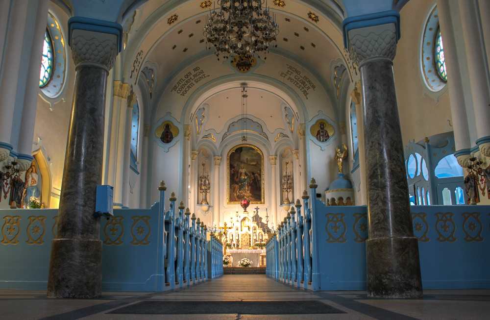 Vienna Bratislava Day Trip: The stunning interior of the Blue Church has light blue pews and an Art Nouveau style altar, and is definitely one of the best things to see in Bratislava.