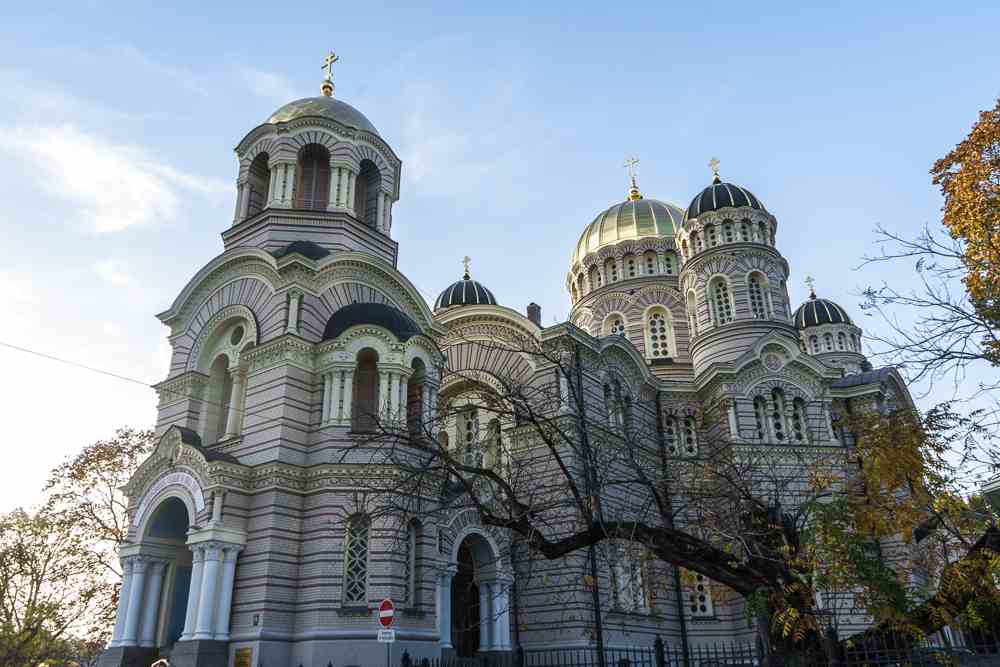 Free Self-Guided Riga Walking Tour: Exterior of the lovely Neo-Byzantine style five-domed Nativity of Christ Cathedral. It is the largest Orthodox church in the Baltics and one of the best places to visit in Riga.