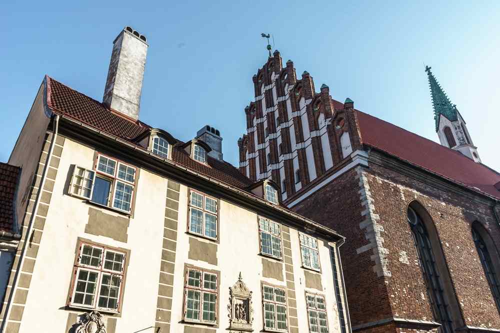 Riga Churches: The Mannerist and Baroque exterior of the Lutheran St. John's Church is one of the best things to see on this free self-guided Riga walking tour.