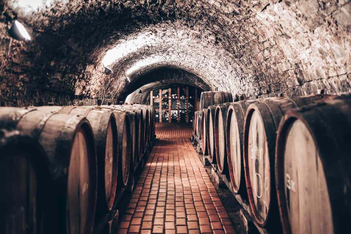 Porto sightseeing: Huge barrels of port wine in a cellar in Vila Nova De Gaia