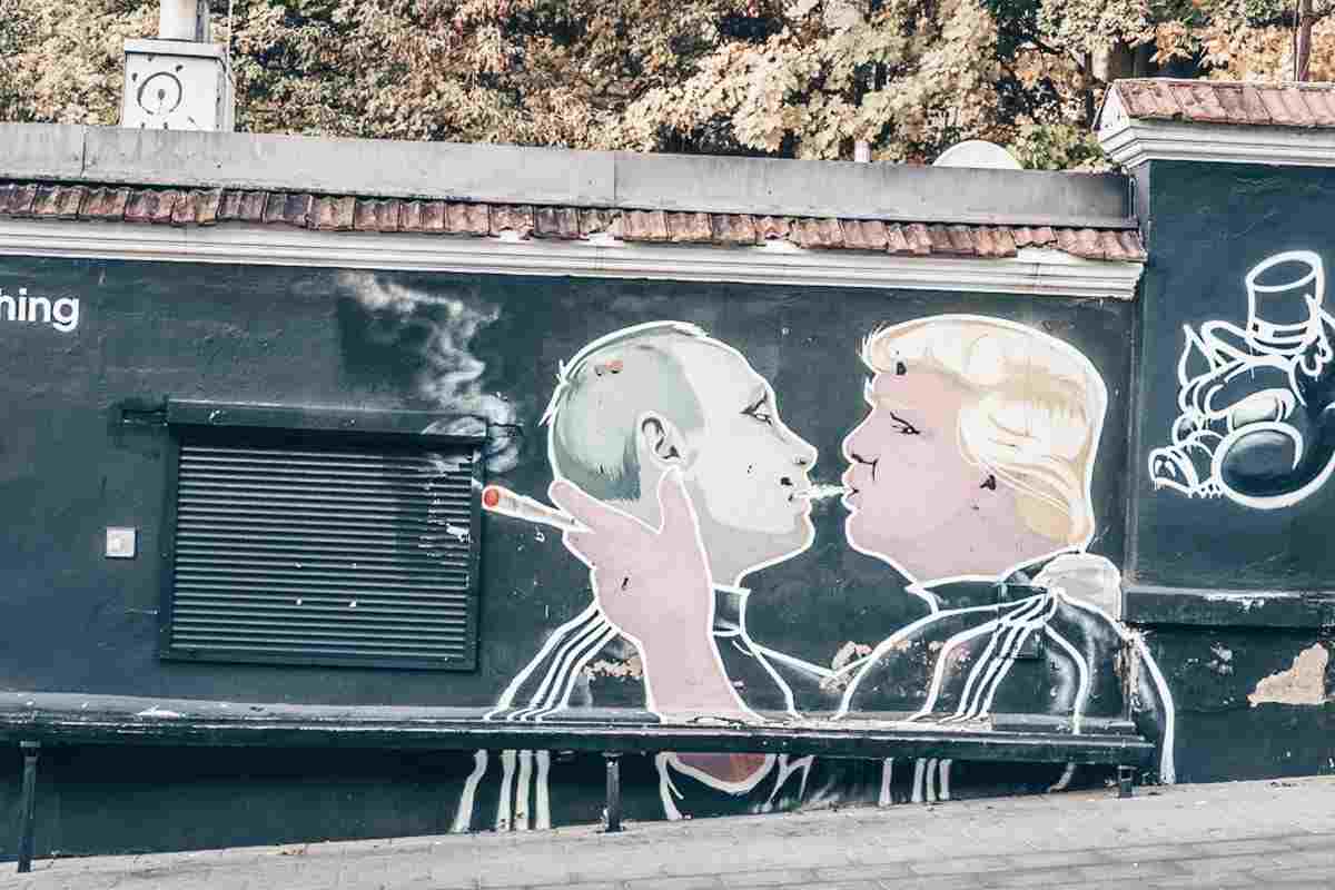 Vilnius Street Art: The famous mural of Putin and Trump, seemingly locking lips.