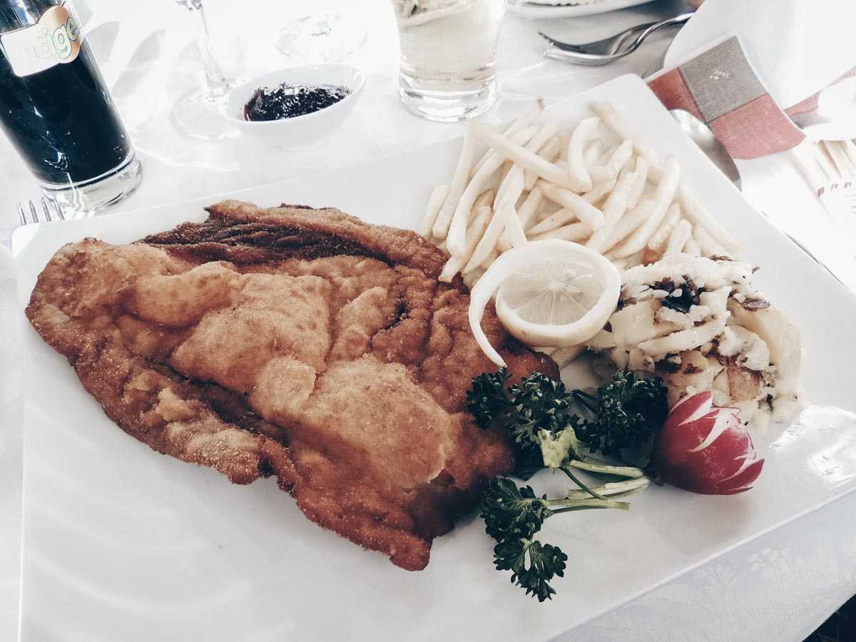 Austrian cuisine: The classic Wiener Schnitzel served with fries