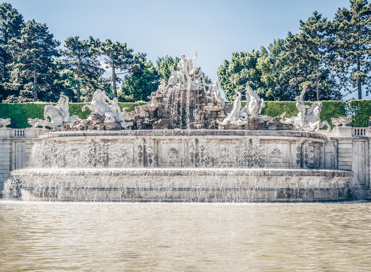 The splendid Baroque-style Neptune Fountain in the Schönbrunn Palace Park
