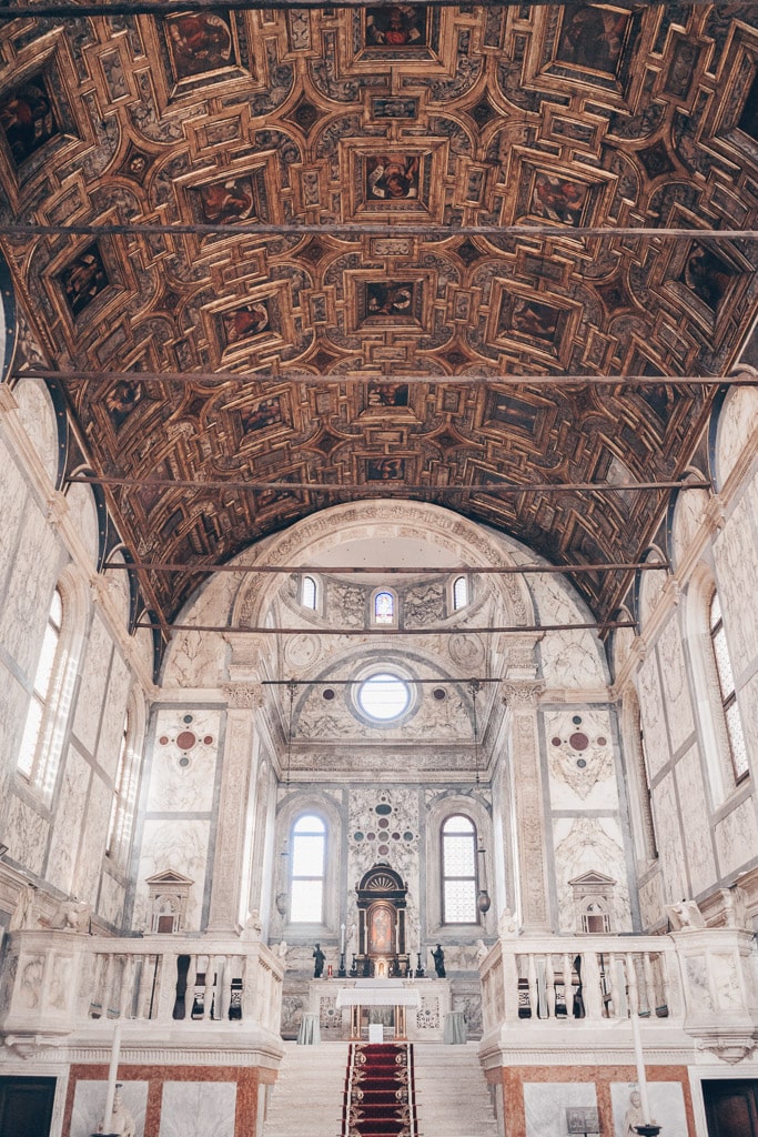 The exquisite marble-lined interior of the Santa Maria dei Miracoli church in Venice, Italy.
