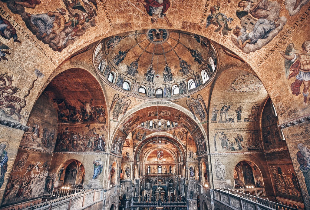 The exquisitely gilded interior of St. Mark's Basilica in Venice, Italy. PC: Heracles Kritikos/Shutterstock.com