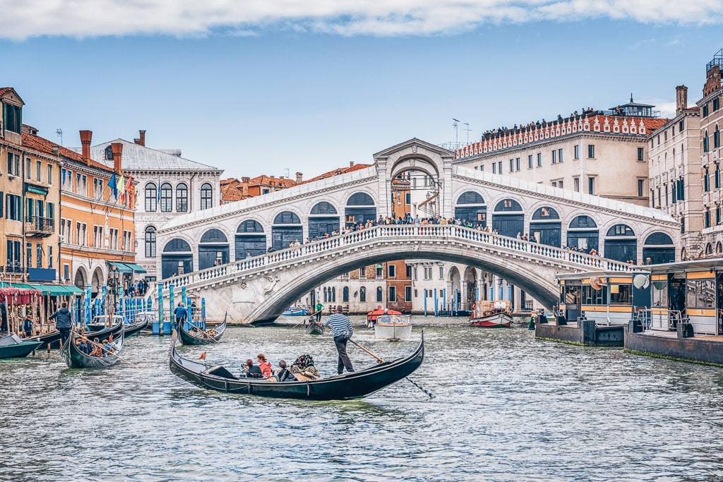 Must-see Venice. The famous Rialto Bridge on the Grand Canal in Venice