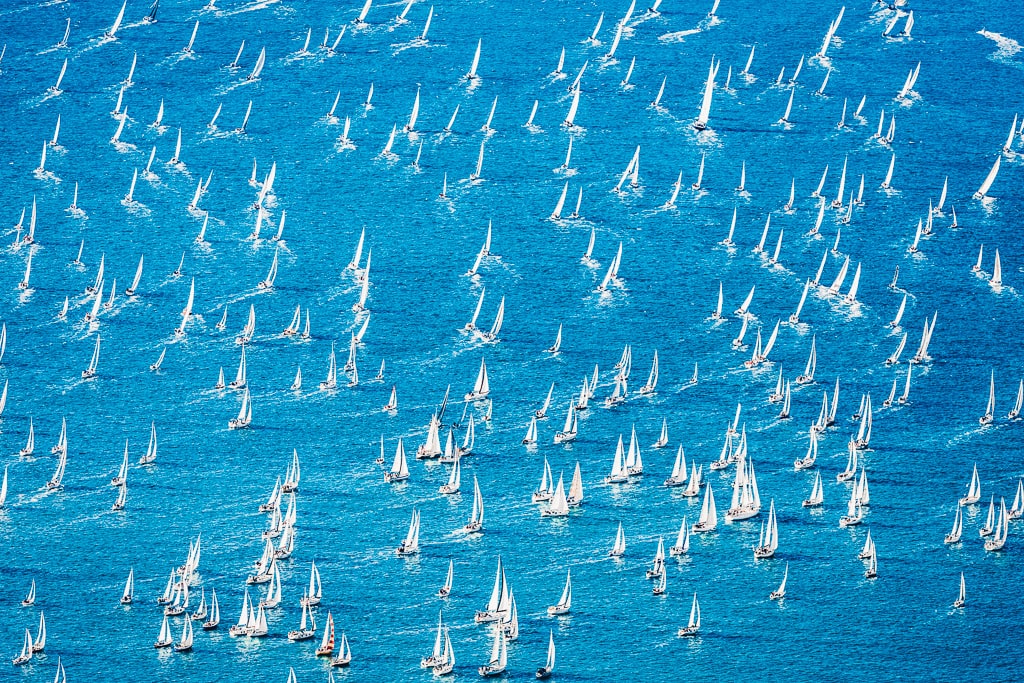 Hundreds of sailboats in the Adriatic Sea during the Barcolana regatta in Trieste.