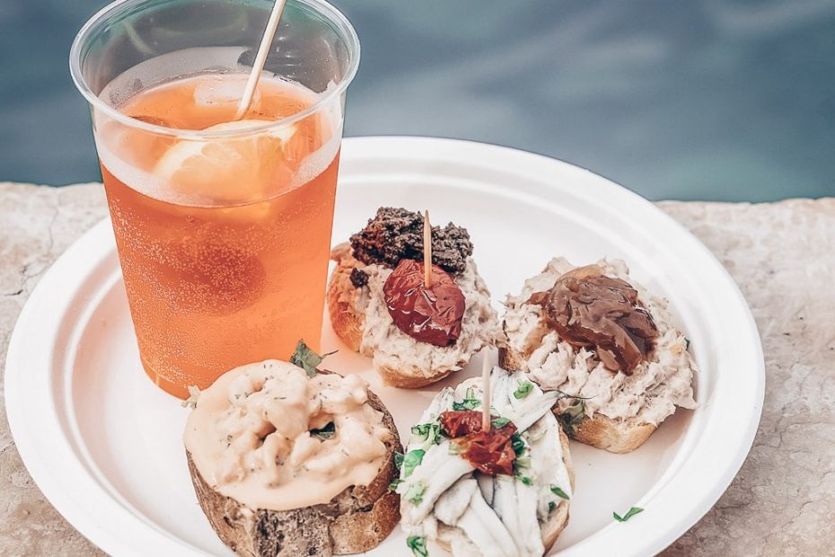 Venice Food: A plate of traditional cicchetti and a glass of Aperol Spritz.