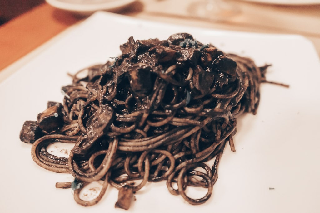 Venice Food: A plate of spaghetti al Nero di Seppia (pasta with black cuttlefish in its own ink sauce) 