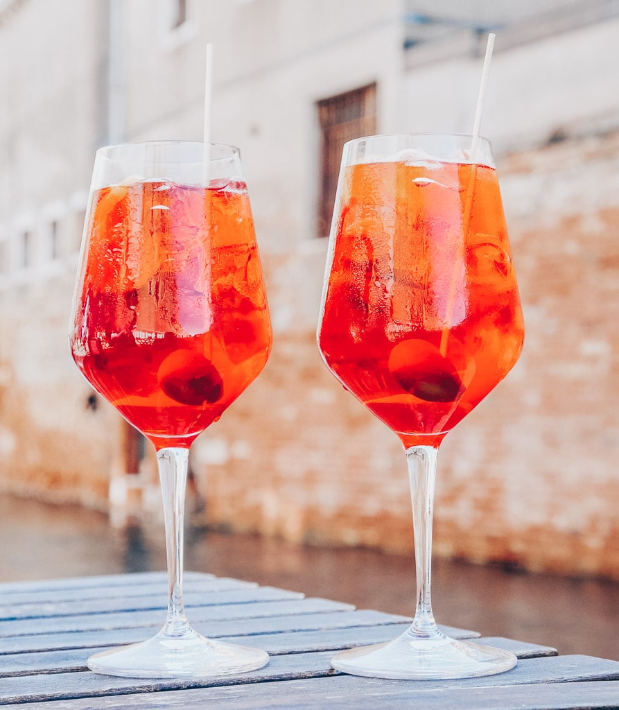 Venice Food: A close-up shot of two glasses of the classic Aperol Spritz aperitif.