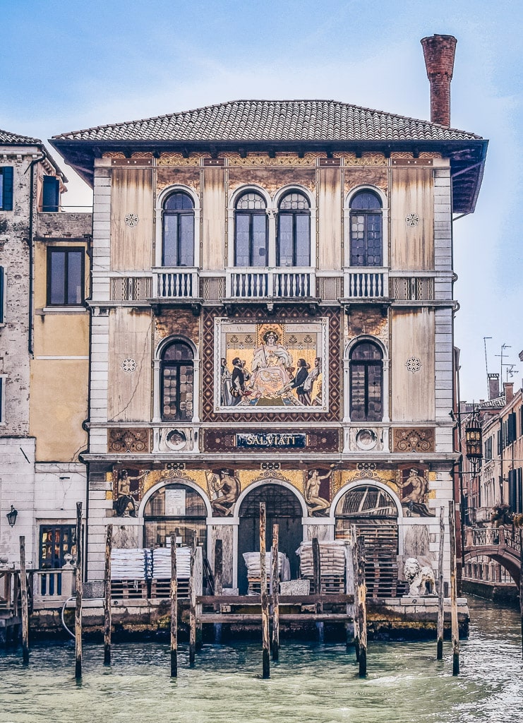 Venice architecture: The conspicously large technicolor mosaic façade of the Palazzo Salviati on the Grand Canal.