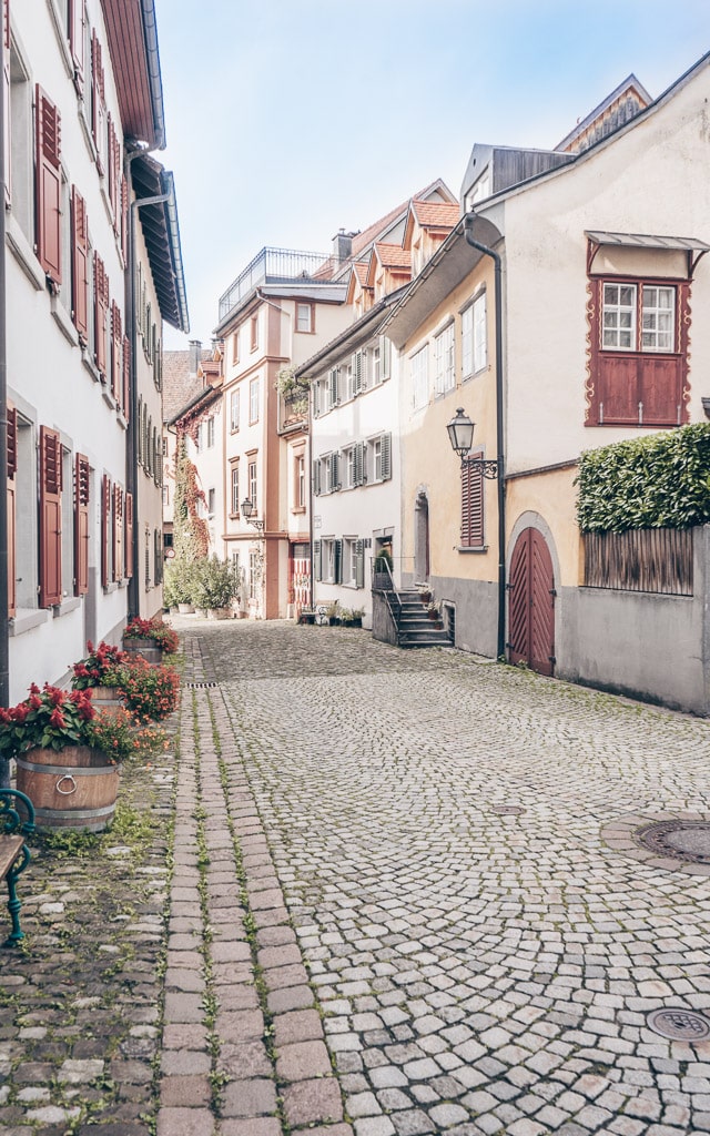 A deserted cobblestone street in the Upper Town (Oberstadt) of Bregenz, Austria