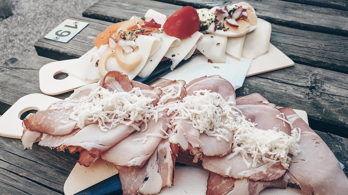 Plate of assorted cold cuts in a typical Austrian Buschenschank.