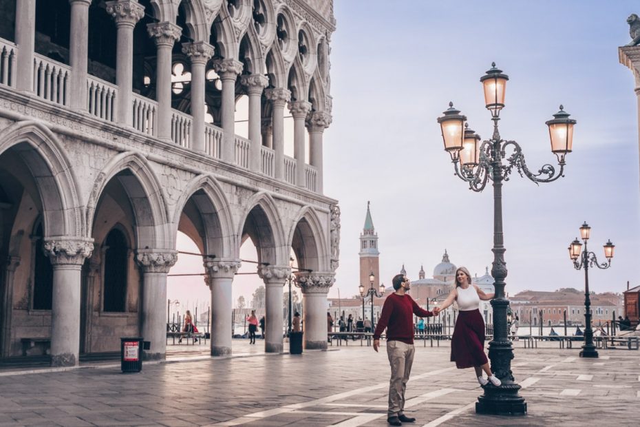 Best Venice Photo Spots: A couple posing in St. Mark's Square near Doge's Palace