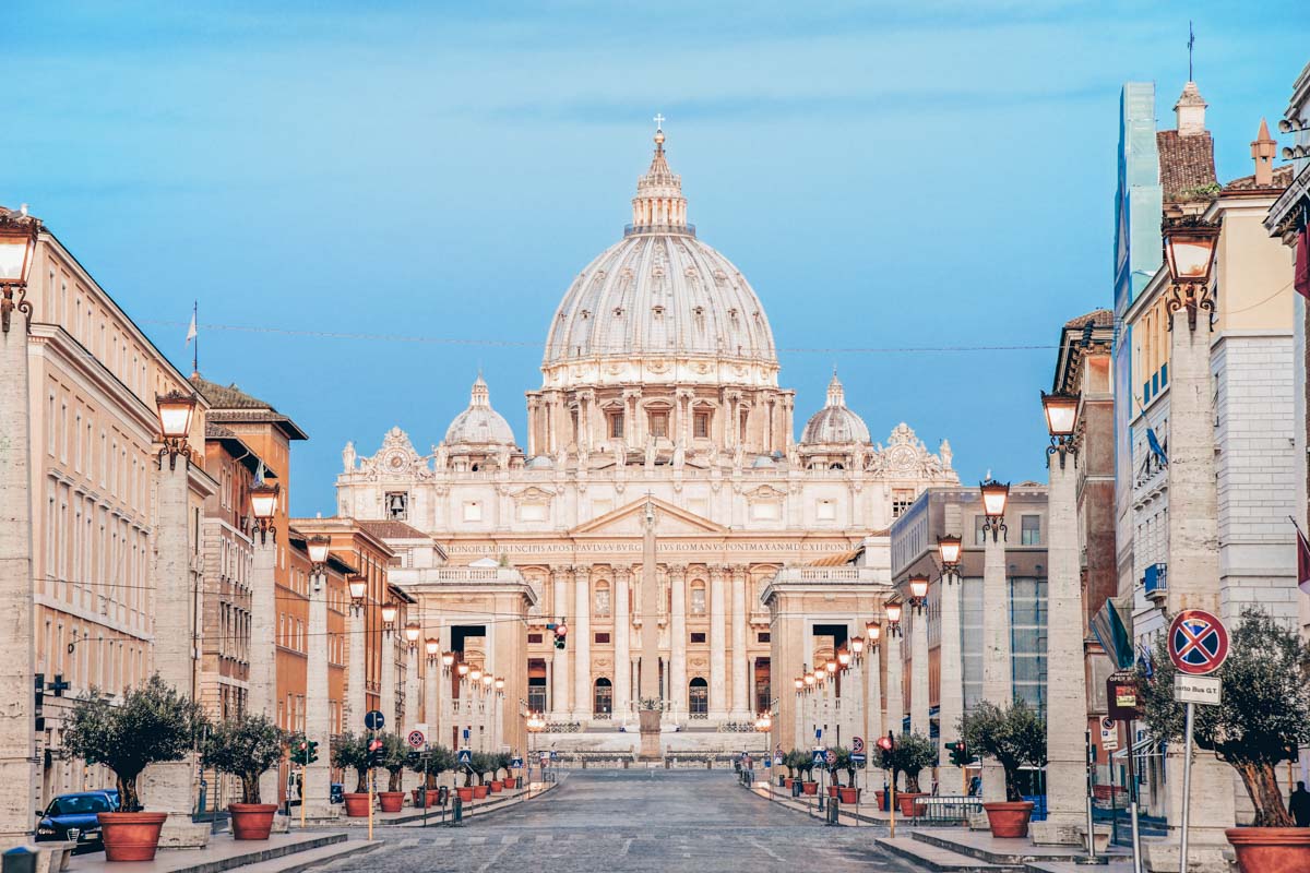 View of St. Peter's Basilica at dawn from Via della Conciliazione in Rome, Italy