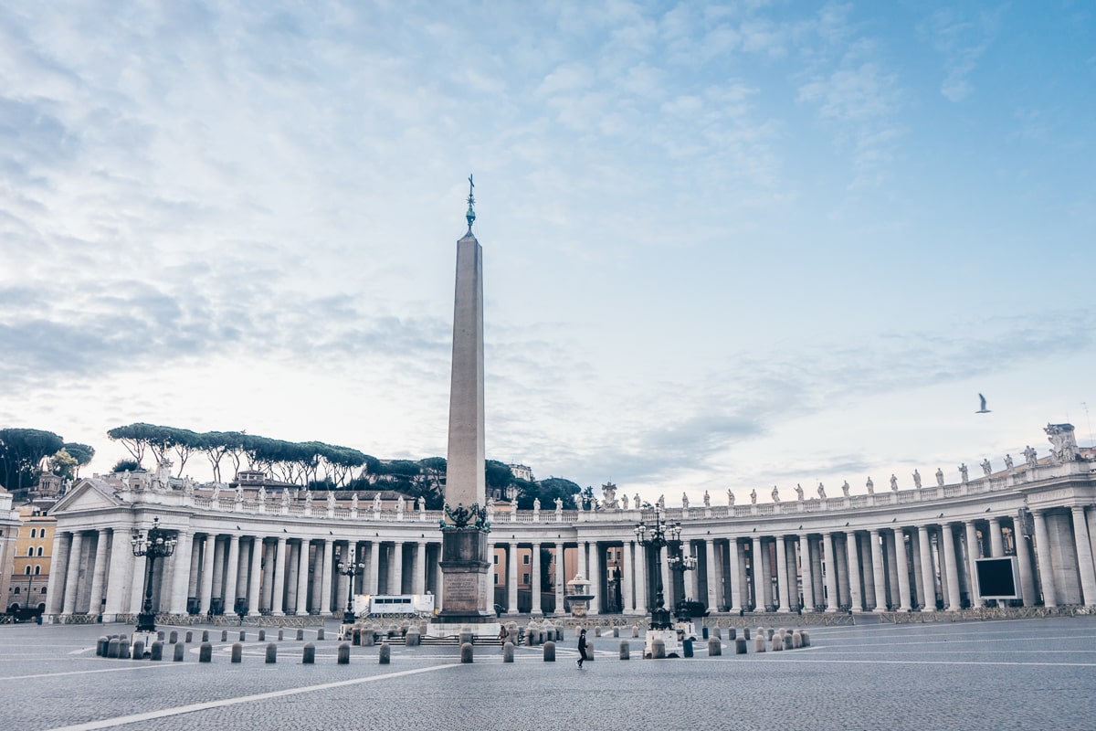 Vatican City attractions: View of the Egyptian obelisk and colonnade in St. Peter's Square