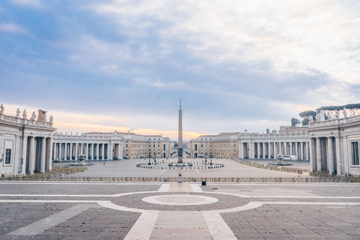 Places to see in Vatican City: An empty St. Peter's Square on an early winter morning