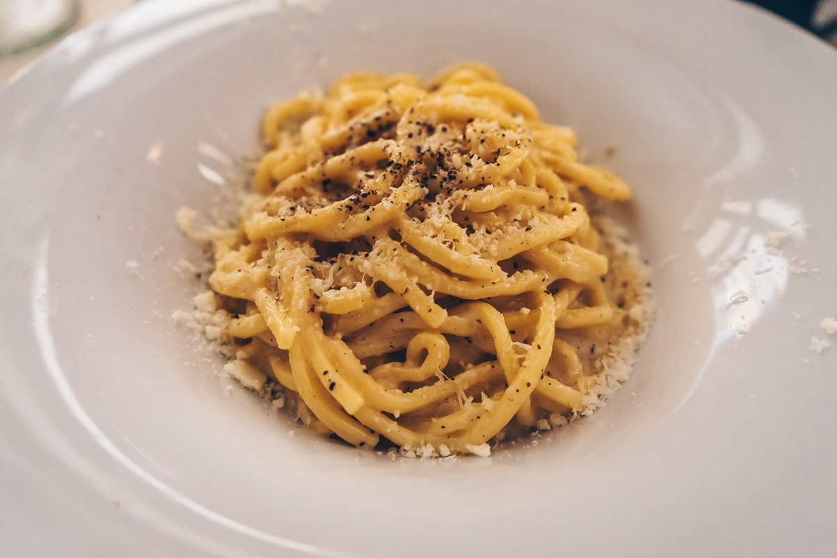 Famous Italian dishes: A plate of Cacio e Pepe, a traditional Roman pasta