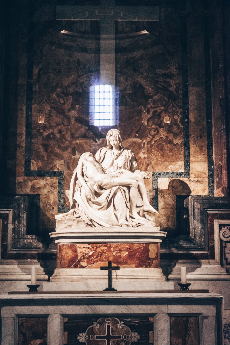 St. Peter's  Basilica: Michelangelo's famous Pieta sculpture, which sits behind protective glass