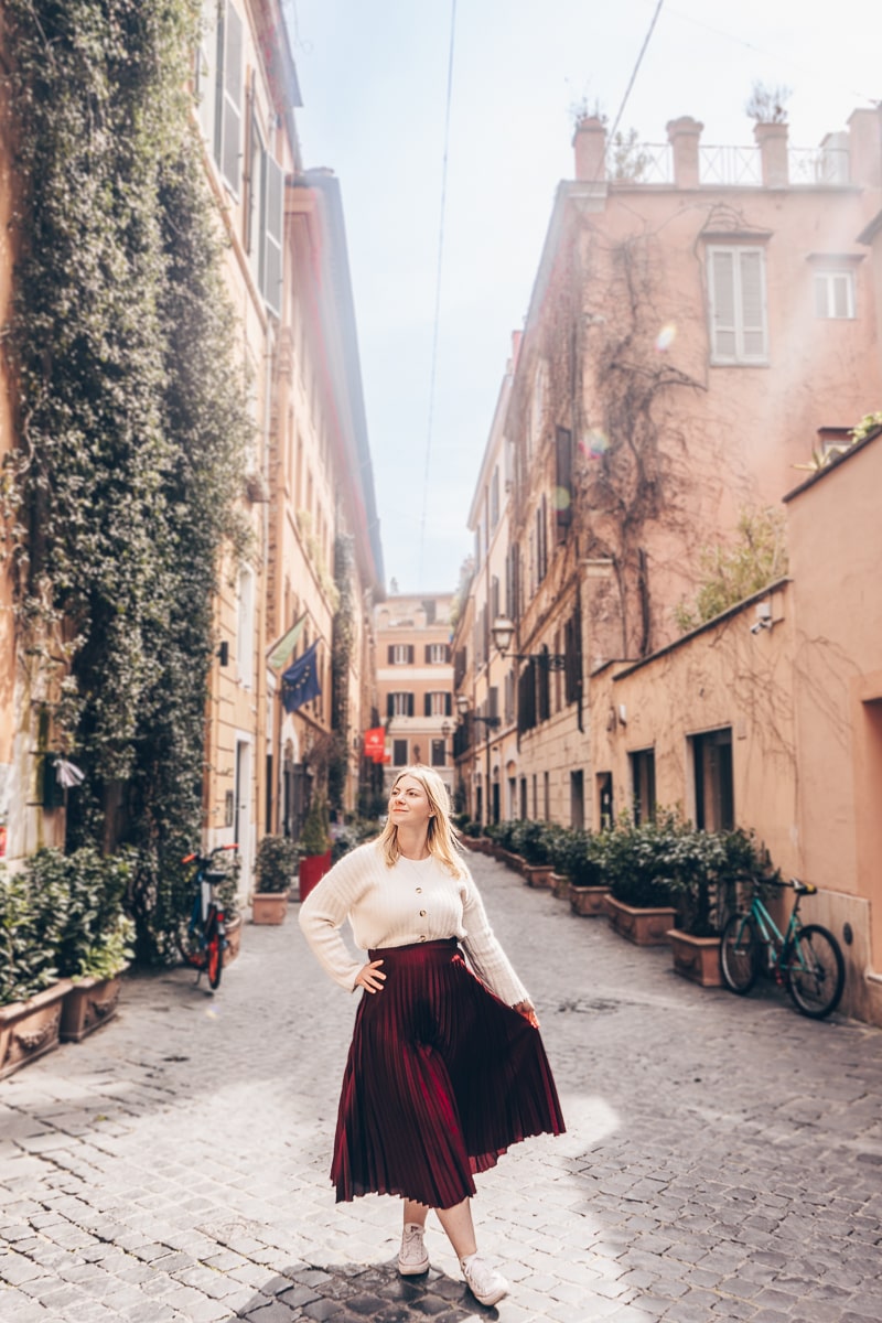 Instagram Rome: A beautiful woman posing for a photo on the charming Via Margutta 