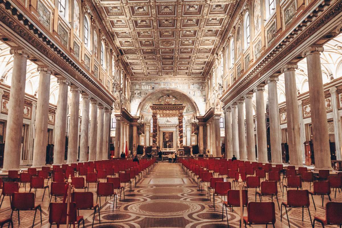 The superb Byantine-style interior of the Basilica of Santa Maria Maggiore with its gold coffered ceiling