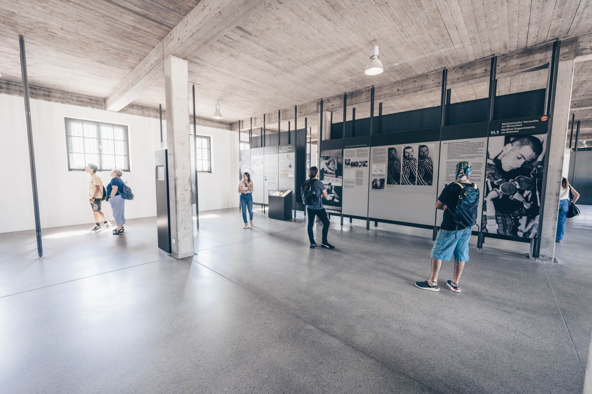 People checking out the various exhibits of the Dachau Concentration Camp Memorial