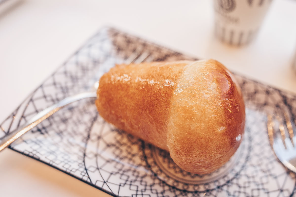 Neapolitan Pastries: The classic baba, a mushroom-shaped small yeast cake doused in rum