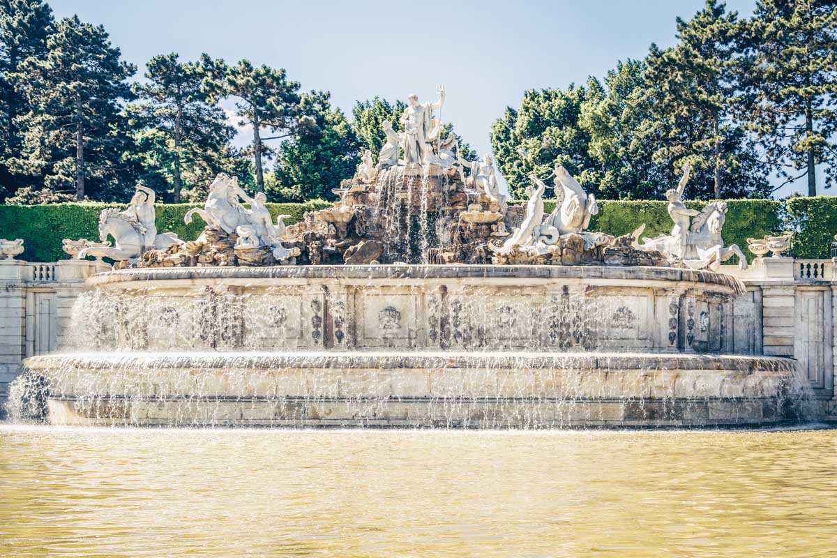 The splendid Baroque-style Neptune Fountain in the Schönbrunn Palace Park