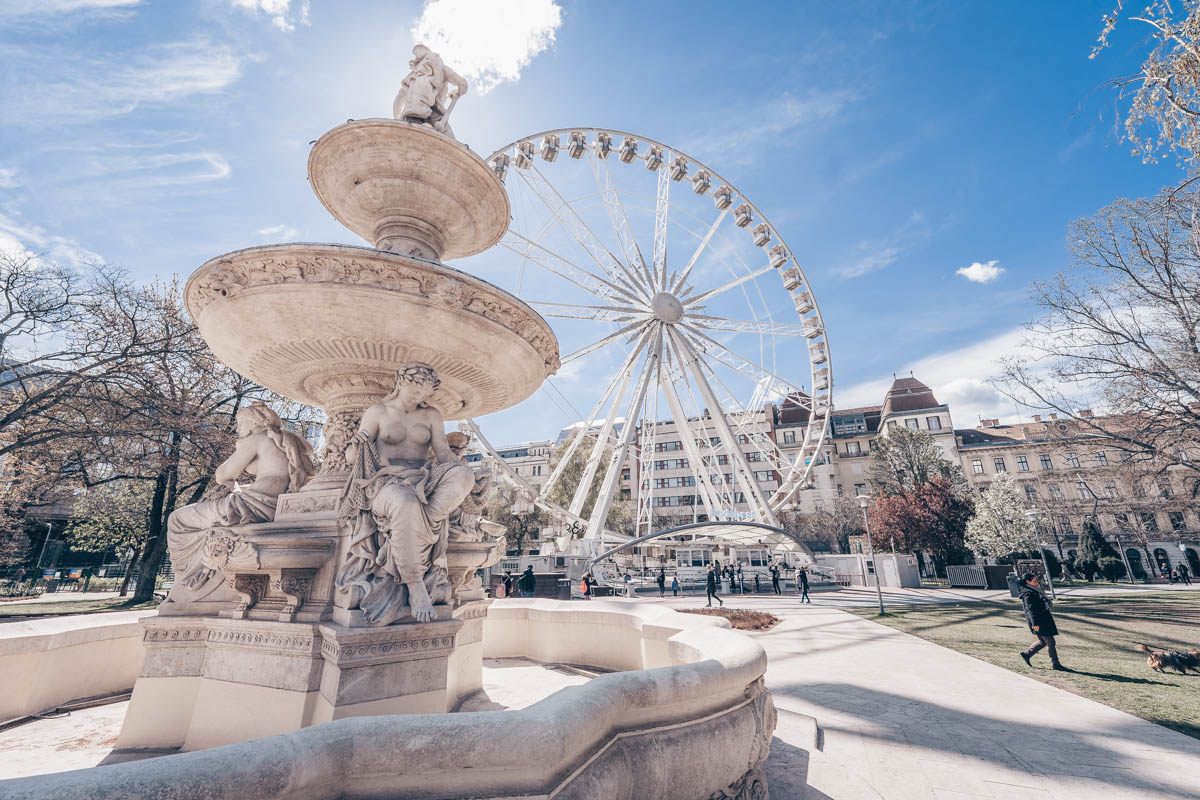 Budapest attractions: The Neo-Renaissance Danube Fountain and giant Ferris Wheel in Elizabeth Square.